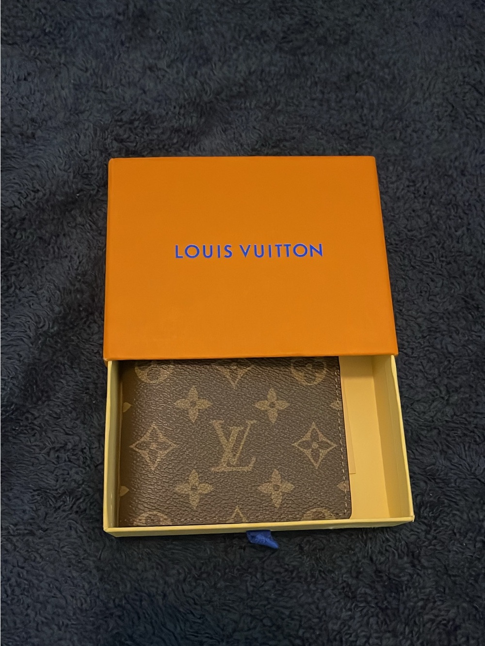 Men’s brown leather LV monogram wallet